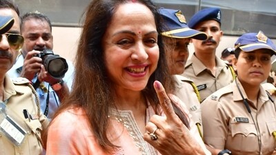 Hema Malini was all smiles as she cast her vote on Monday. Hema Malini was all smiles as she cast her vote on Monday.