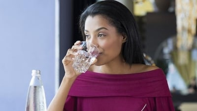 Avoid drinking water with meals as it dilutes the digestive enzymes present in stomach. Drink water 10 minutes before or after food. (iStock) Avoid drinking water with meals as it dilutes the digestive enzymes present in stomach. Drink water 10 minutes before or after food. (iStock)