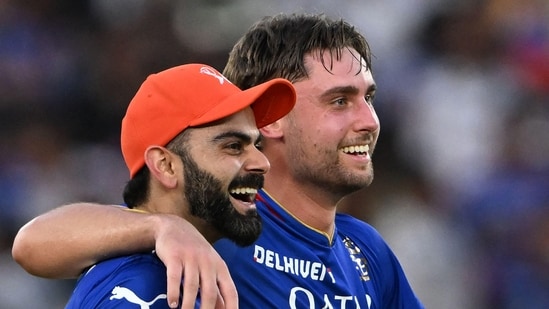 Royal Challengers Bengaluru's Virat Kohli and Will Jacks (R) celebrate their team's win in the Indian Premier League match against Gujarat Titans. (AFP)