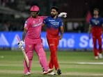 Rajasthan Royals' Shimron Hetmyer (L) and Royal Challengers Bengaluru's Mohammed Siraj (C) look on at the end of the Indian Premier League (IPL) Twenty20 cricket match between Rajasthan Royals and Royal Challengers Bengaluru Rajasthan Royals' Shimron Hetmyer (L) and Royal Challengers Bengaluru's Mohammed Siraj (C) look on at the end of the Indian Premier League (IPL) Twenty20 cricket match between Rajasthan Royals and Royal Challengers Bengaluru