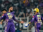 Kolkata Knight Riders player Varun Chakaravarthy with his teammates celebrates the wicket of Sunrisers Hyderabad's Heinrich Klaasen during the Indian Premier League.