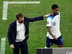 England's Marcus Rashford with manager Gareth Southgate after being substituted 