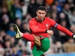 Portugal's Cristiano Ronaldo attempts a shot at goal during the international friendly soccer match between Slovenia and Portugal at the Stozice stadium in Ljubljana, Slovenia, Tuesday, March 26, 2024 Portugal's Cristiano Ronaldo attempts a shot at goal during the international friendly soccer match between Slovenia and Portugal at the Stozice stadium in Ljubljana, Slovenia, Tuesday, March 26, 2024