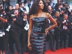 Naomi Campbell re-wore a black sequin Chanel dress from their Autumn/Winter 1996 collection