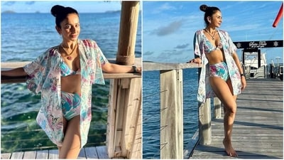 Rakul Preet Singh's latest look in a stylish tropical printed bikini is perfect for the beach. Her ensemble, featuring a plunging bralette top and high-waisted bottoms paired with a matching shrug, is sure to inspire your summer vacation wardrobe. (Instagram/@rakulpreet) Rakul Preet Singh's latest look in a stylish tropical printed bikini is perfect for the beach. Her ensemble, featuring a plunging bralette top and high-waisted bottoms paired with a matching shrug, is sure to inspire your summer vacation wardrobe. (Instagram/@rakulpreet)