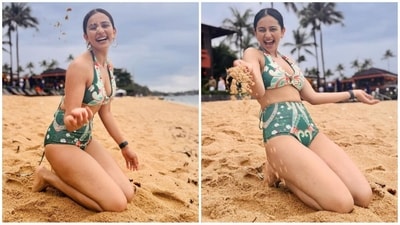 Rakul Preet Singh is definitely a fan of tropical prints and her bikini looks are proof of that. Her playful beach look in a stunning green bikini showcases the perfect blend of colours and trendiness. The halterneck bralette top and high-waisted bottoms adorned with vibrant floral prints bring together the perfect beach look. (Instagram/@rakulpreet) Rakul Preet Singh is definitely a fan of tropical prints and her bikini looks are proof of that. Her playful beach look in a stunning green bikini showcases the perfect blend of colours and trendiness. The halterneck bralette top and high-waisted bottoms adorned with vibrant floral prints bring together the perfect beach look. (Instagram/@rakulpreet)