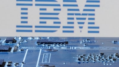 IBM logo is seen near computer motherboard in this illustration. (Reuters)