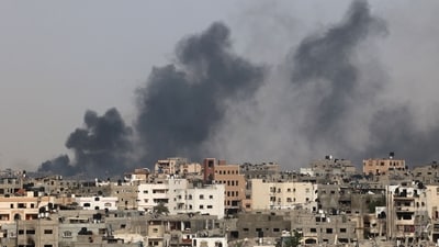 Smoke billows after an Israeli strike on Jabalia as seen from Beit Lahia, in the northern Gaza Strip on May 19, 2024, amid the ongoing conflict between Israel and the militant Hamas group. (AFP) Smoke billows after an Israeli strike on Jabalia as seen from Beit Lahia, in the northern Gaza Strip on May 19, 2024, amid the ongoing conflict between Israel and the militant Hamas group. (AFP)