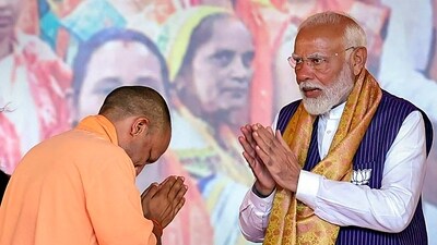 Prime Minister Narendra Modi and Chief Minister Yogi Adityanath at a Nari Shakti Vandan program, in Varanasi, Tuesday, May 21, 2024. (PTI) Prime Minister Narendra Modi and Chief Minister Yogi Adityanath at a Nari Shakti Vandan program, in Varanasi, Tuesday, May 21, 2024. (PTI)