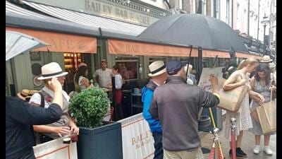 People celebrating Bloomsday outside The Bailey pub in Dublin on 16th June 2023. Bloomsday celebrates the publication of James Joyce’s Ulysses. (Derick P Hudson/Shutterstock)