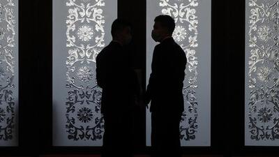 Soldiers dressed as ushers stand watch against a door during a deliberation on the government work report by Tibet delegations, on the sideline of the National People's Congress at the Great Hall of the People in Beijing on March 6. (AP) Soldiers dressed as ushers stand watch against a door during a deliberation on the government work report by Tibet delegations, on the sideline of the National People's Congress at the Great Hall of the People in Beijing on March 6. (AP)