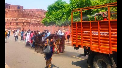 Sprinkler of Agra Nagar Nigam at Agra Fort on Tuesday. (HT)
