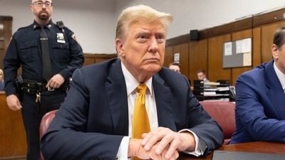 Former US President Donald Trump, center, and Todd Blanche, attorney for former US President Donald Trump, right, at Manhattan criminal court in New York, US, on Tuesday, May 21, 2024. Trump faces 34 felony counts of falsifying business records as part of an alleged scheme to silence claims of extramarital sexual encounters during his 2016 presidential campaign. Photographer: Justin Lane/EPA/Bloomberg (Bloomberg) Former US President Donald Trump, center, and Todd Blanche, attorney for former US President Donald Trump, right, at Manhattan criminal court in New York, US, on Tuesday, May 21, 2024. Trump faces 34 felony counts of falsifying business records as part of an alleged scheme to silence claims of extramarital sexual encounters during his 2016 presidential campaign. Photographer: Justin Lane/EPA/Bloomberg (Bloomberg)