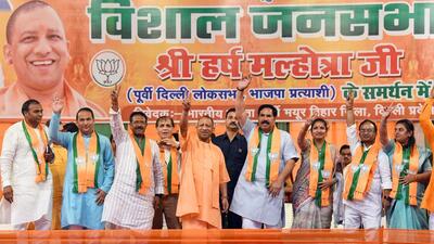Uttar Pradesh CM Yogi Adityanath (centre) at a public meeting in support of BJP East Delhi candidate Harsh Malhotra in Mayur Vihar, New Delhi on Monday. (ANI Photo) Uttar Pradesh CM Yogi Adityanath (centre) at a public meeting in support of BJP East Delhi candidate Harsh Malhotra in Mayur Vihar, New Delhi on Monday. (ANI Photo)
