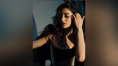 Ananya completed the look wearing a black oversized jacket, an open front, raised collars, and a cropped hem. (Instagram) Ananya completed the look wearing a black oversized jacket, an open front, raised collars, and a cropped hem. (Instagram)