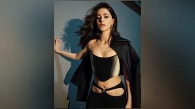 Ananya accessorised the futuristic ensemble with gold rings and statement earrings featuring emerald gemstones. For her hairstyle, she left her locks open and styled them in a side-parting and soft waves. (Instagram) Ananya accessorised the futuristic ensemble with gold rings and statement earrings featuring emerald gemstones. For her hairstyle, she left her locks open and styled them in a side-parting and soft waves. (Instagram)