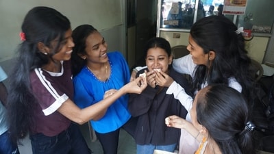 After the announcement of Maharashtra HSC Board 12th result, students are seen giving sweet in Thane (Praful Gangurde) After the announcement of Maharashtra HSC Board 12th result, students are seen giving sweet in Thane (Praful Gangurde)