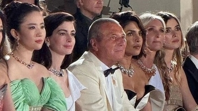 Priyanka Chopra was seen sitting with the trio at the event. Anne Hathaway looked stunning in a thigh-high slit white outfit. Shu Qi wore a blue and red outfit, while Liu Yifei was seen in a green and golden dress. Priyanka Chopra was seen sitting with the trio at the event. Anne Hathaway looked stunning in a thigh-high slit white outfit. Shu Qi wore a blue and red outfit, while Liu Yifei was seen in a green and golden dress.