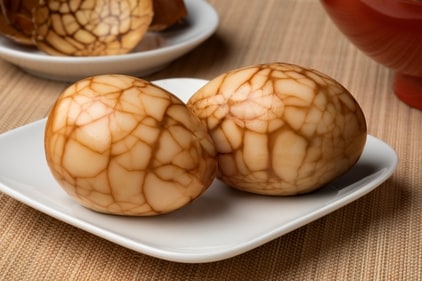 In Chinese marbled tea eggs, the tea-flavoured liquid seasons the eggs and gives them a marble-like appearance (Shutterstock) In Chinese marbled tea eggs, the tea-flavoured liquid seasons the eggs and gives them a marble-like appearance (Shutterstock)