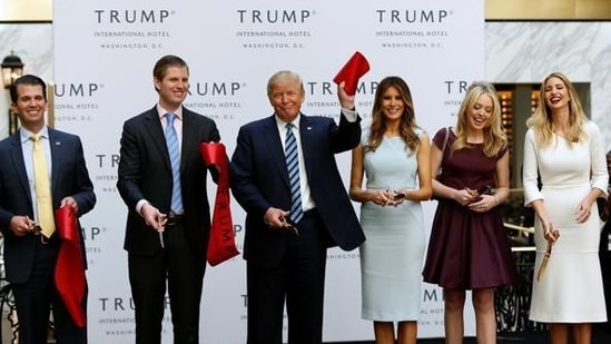 Donald Trump Jr., Eric Trump, Republican US presidential nominee Donald Trump, Melania Trump, Tiffany Trump and Ivanka Trump attend an official ribbon cutting ceremony at the new Trump International Hotel in Washington. (REUTERS)