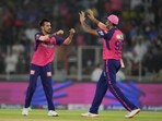 Rajasthan Royals' Yuzvendra Chahal, left, celebrates with teammate Ravichandran Ashwin after the dismissal of Royal Challengers Bengaluru's Virat Kohli Rajasthan Royals' Yuzvendra Chahal, left, celebrates with teammate Ravichandran Ashwin after the dismissal of Royal Challengers Bengaluru's Virat Kohli