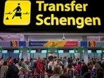 Passengers arriving at the Henri Coanda International Airport pass under a Schengen Information sign, in Otopeni, near Bucharest, Romania. Travelling to Europe? Here's what tourists need to know as Schengen visa fees set to increase globally 