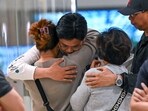 Passengers of Singapore Airlines flight SQ321 from London to Singapore, which made an emergency landing in Bangkok, greet family members upon arrival at Changi Airport in Singapore. Passengers of Singapore Airlines flight SQ321 from London to Singapore, which made an emergency landing in Bangkok, greet family members upon arrival at Changi Airport in Singapore.
