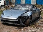 The Porsche Taycan, involved in the Pune accident, was running without a licence plate. (PTI) The Porsche Taycan, involved in the Pune accident, was running without a licence plate. (PTI)