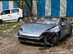 The Porsche Taycan, involved in the Pune accident, was running without a licence plate. (PTI) The Porsche Taycan, involved in the Pune accident, was running without a licence plate. (PTI)