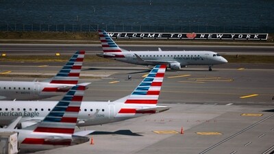 American Airlines planes at Terminal B of LaGuardia Airport (LGA) in the Queens borough of New York, US, on Sunday, April 7, 2024. American Airlines Group Inc. is expected to release earnings figures on April 25. Photographer: Angus Mordant/Bloomberg (Bloomberg) American Airlines planes at Terminal B of LaGuardia Airport (LGA) in the Queens borough of New York, US, on Sunday, April 7, 2024. American Airlines Group Inc. is expected to release earnings figures on April 25. Photographer: Angus Mordant/Bloomberg (Bloomberg)