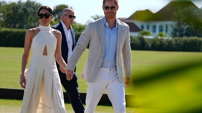 Britain's Prince Harry and wife Meghan Markle, Duchess of Sussex, arrive for the 2024 Royal Salute Polo Challenge to Benefit Sentebale, Friday, April 12, 2024, in Wellington, Fla. Prince Harry, co-founding patron of the Sentebale charity, will play on the Royal Salute Sentebale Team. (AP Photo/Rebecca Blackwell) (AP) Britain's Prince Harry and wife Meghan Markle, Duchess of Sussex, arrive for the 2024 Royal Salute Polo Challenge to Benefit Sentebale, Friday, April 12, 2024, in Wellington, Fla. Prince Harry, co-founding patron of the Sentebale charity, will play on the Royal Salute Sentebale Team. (AP Photo/Rebecca Blackwell) (AP)