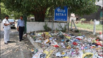 During inspections, residents in Beta 1 and 2 alleged that the waste collection vehicles were not coming to the area regularly and cleaning was not being done properly. (HT Photo) During inspections, residents in Beta 1 and 2 alleged that the waste collection vehicles were not coming to the area regularly and cleaning was not being done properly. (HT Photo)