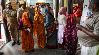 Voters queue at a polling station during the fourth phase of voting for national elections in Kanpur, Uttar Pradesh. Voters queue at a polling station during the fourth phase of voting for national elections in Kanpur, Uttar Pradesh.