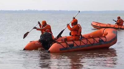 NDRF personnel during a search and rescue operation after six persons, including two children, drowned as their boat capsized on Tuesday evening in the Ujani dam backwaters, in Pune district, Wednesday. (PTI)