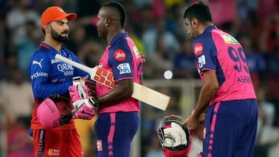 Rajasthan Royals' players R Powell and R Ashwin being greeted by Virat Kohli as they celebrate their win (PTI) Rajasthan Royals' players R Powell and R Ashwin being greeted by Virat Kohli as they celebrate their win (PTI)