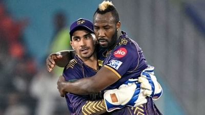 Kolkata Knight Riders' Andre Russell (R) and wicketkeeper Rahmanullah Gurbaz celebrate (AFP) Kolkata Knight Riders' Andre Russell (R) and wicketkeeper Rahmanullah Gurbaz celebrate (AFP)