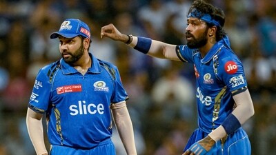Mumbai Indians' captain Hardik Pandya (R) gestures as Rohit Sharma looks on (AFP) Mumbai Indians' captain Hardik Pandya (R) gestures as Rohit Sharma looks on (AFP)