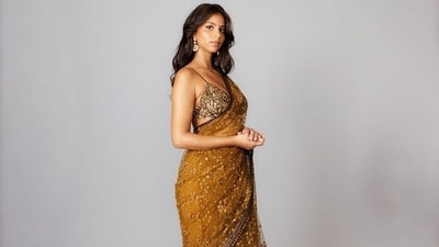 Suhana Khan wore a mustard and copper Sabyasachi saree with a sexy bralette as she attended the Nita Mukesh Ambani Cultural Centre (NMACC) grand opening celebrations in Mumbai earlier this year. Allowing her stunning saree to do all the talking, she paired her look with minimal makeup and jewellery. Suhana Khan wore a mustard and copper Sabyasachi saree with a sexy bralette as she attended the Nita Mukesh Ambani Cultural Centre (NMACC) grand opening celebrations in Mumbai earlier this year. Allowing her stunning saree to do all the talking, she paired her look with minimal makeup and jewellery.