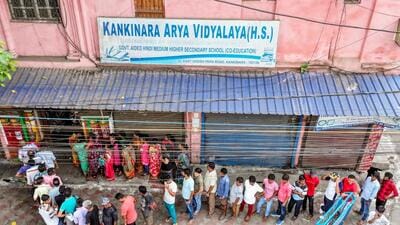 Voters queue up to cast their vote at a polling station in Barrackpore, West Bengal, on Monday. (ANI) Voters queue up to cast their vote at a polling station in Barrackpore, West Bengal, on Monday. (ANI)