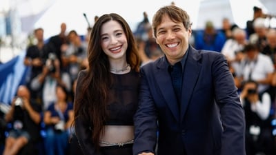 Director Sean Baker and cast member Mikey Madison pose during a photocall for the film Anora at the Cannes Film Festival. (REUTERS)