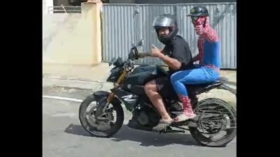 Bengaluru: 'Spider-Man' riding pillion in JP Nagar. (X/@vishalanandtwts)
