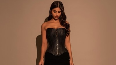 In November 2023, Suhana Khan channelled Archies character Veronica Lodge’s bold style in a black corset, which she wore with a black pencil skirt that featured a daring thigh-high slit. In November 2023, Suhana Khan channelled Archies character Veronica Lodge’s bold style in a black corset, which she wore with a black pencil skirt that featured a daring thigh-high slit.
