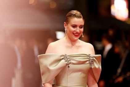 Jury member Greta Gerwig poses for photographers upon arrival at the premiere of the film 'The Shrouds' at the 77th international film festival, Cannes, (AP)
