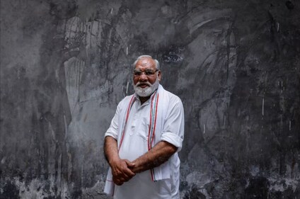 Rasid Ahmed poses for a picture outside one of his son's house in New Delhi. Rasid Ahmed poses for a picture outside one of his son's house in New Delhi.