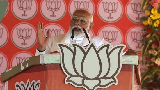 Prime Minister Narendra Modi delivers a speech during his election campaign rally. (AFP)