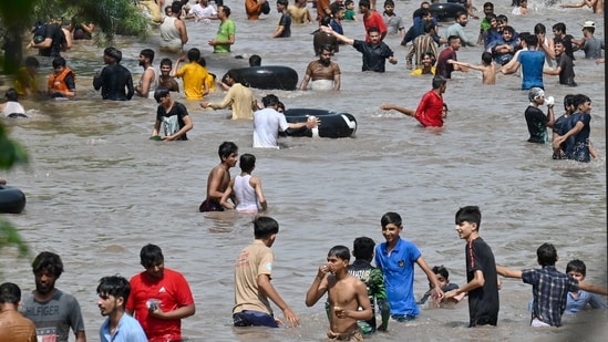 The weather department has suggested drinking sufficient water and using ORS or homemade drinks such as lassi,&nbsp;torani&nbsp;(rice water), lemon water and buttermilk to stay hydrated.(AFP)