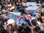 Flag-draped coffins of President Ebrahim Raisi and his companions who were killed in a helicopter crash on Sunday. (AP)