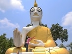 Buddha Purnima 2024: A statue of Lord Buddha being cleaned as part of preparations ahead of Buddha Purnima festival, in Agartala.