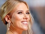 Scarlett Johansson poses on the red carpet during the Oscars arrivals at the 92nd Academy Awards in Hollywood.