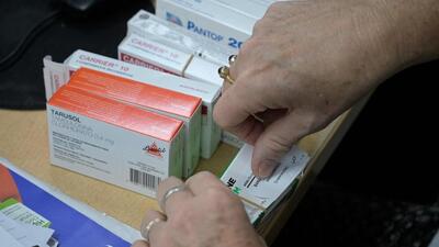 A volunteer prepares prescription medicines to give them for free to those most in need at the Tzedaka Foundation's Community Medicine Bank in Buenos Aires, Argentina. (AFP) A volunteer prepares prescription medicines to give them for free to those most in need at the Tzedaka Foundation's Community Medicine Bank in Buenos Aires, Argentina. (AFP)
